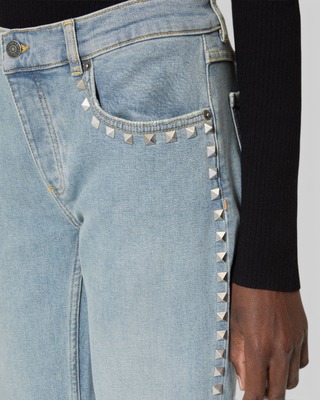 Long slim jeans with blue studs