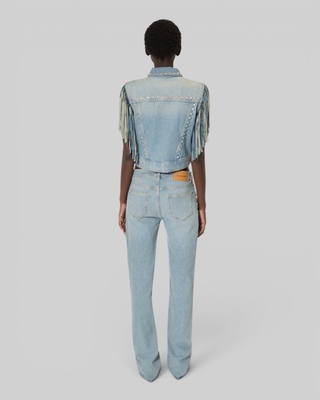 Blue denim jacket with bangs and studs