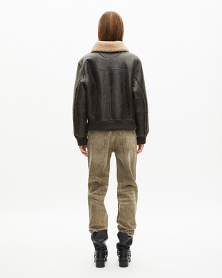 Short brown woolly skin