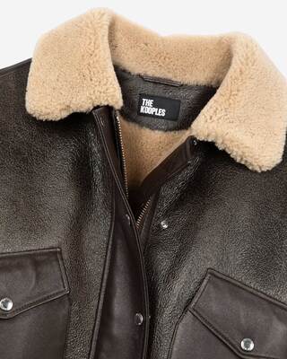 Short brown woolly skin