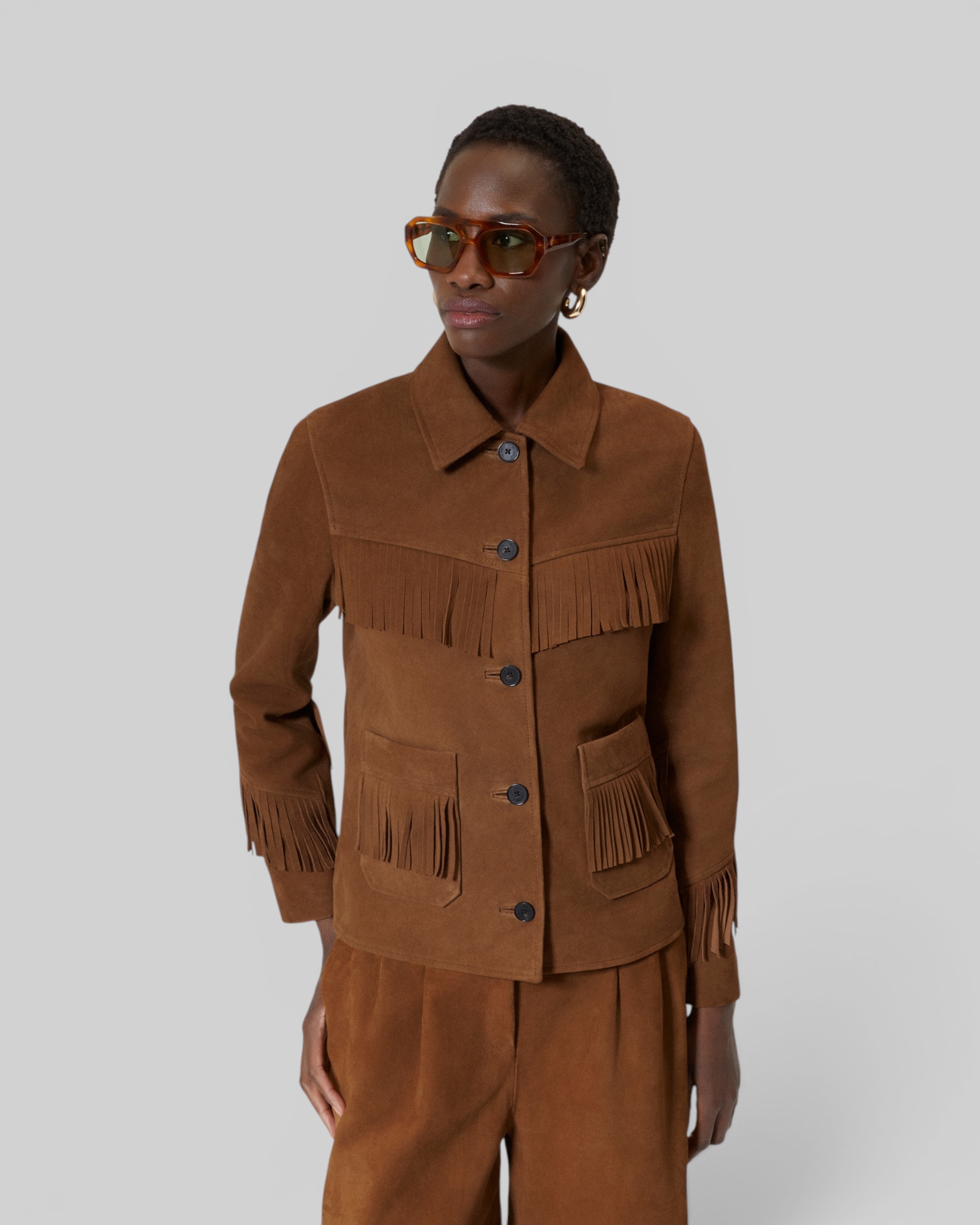 Suede leather jacket with camel fringe