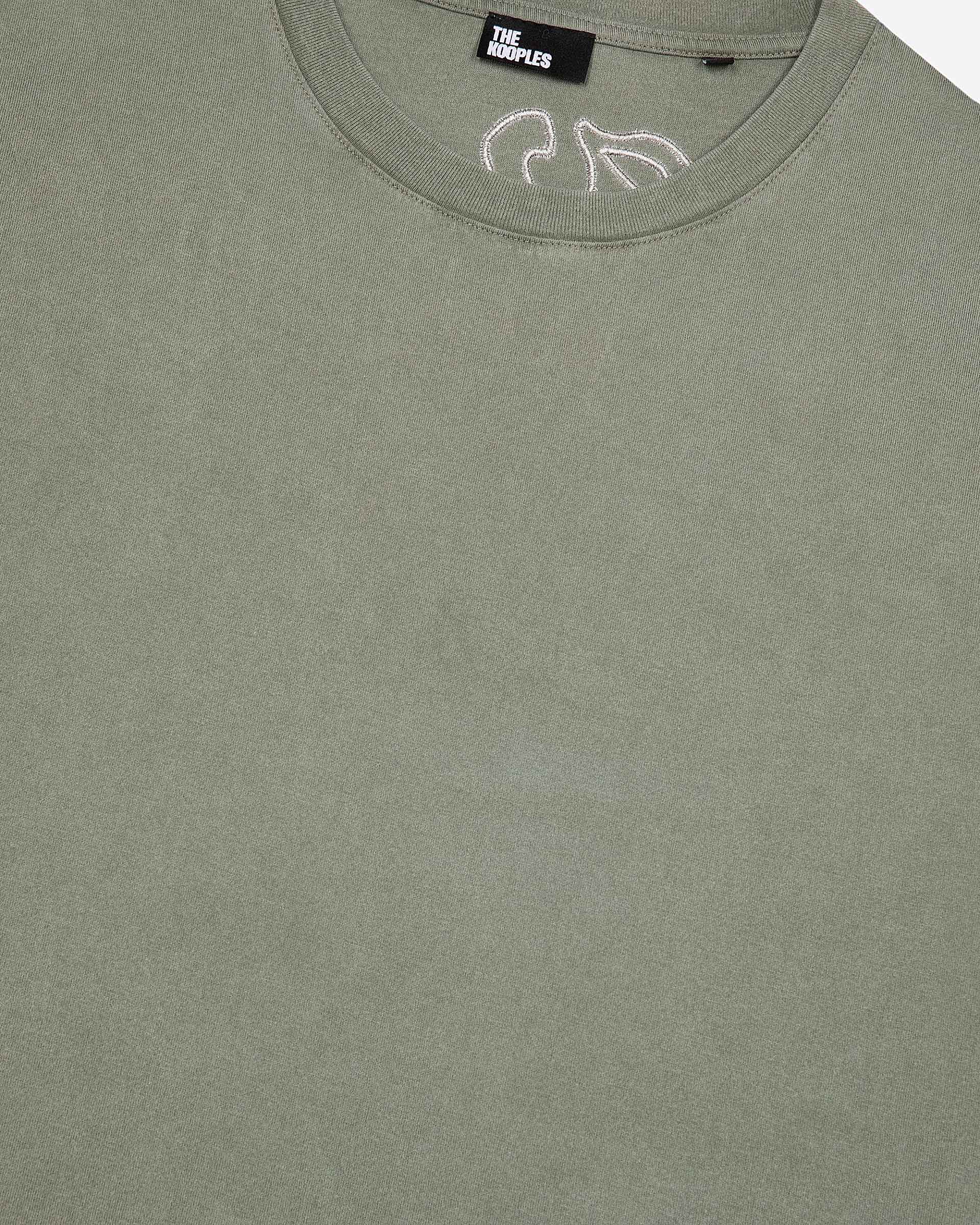 T-shirt with green logo on back