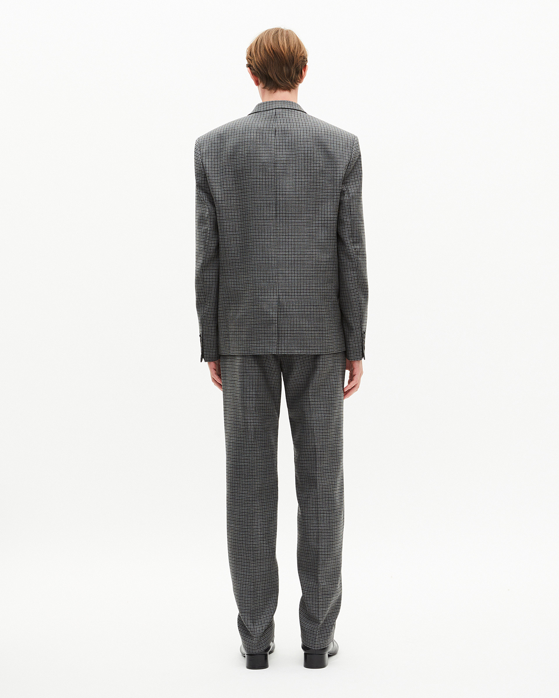 Black and grey houndstooth suit jacket