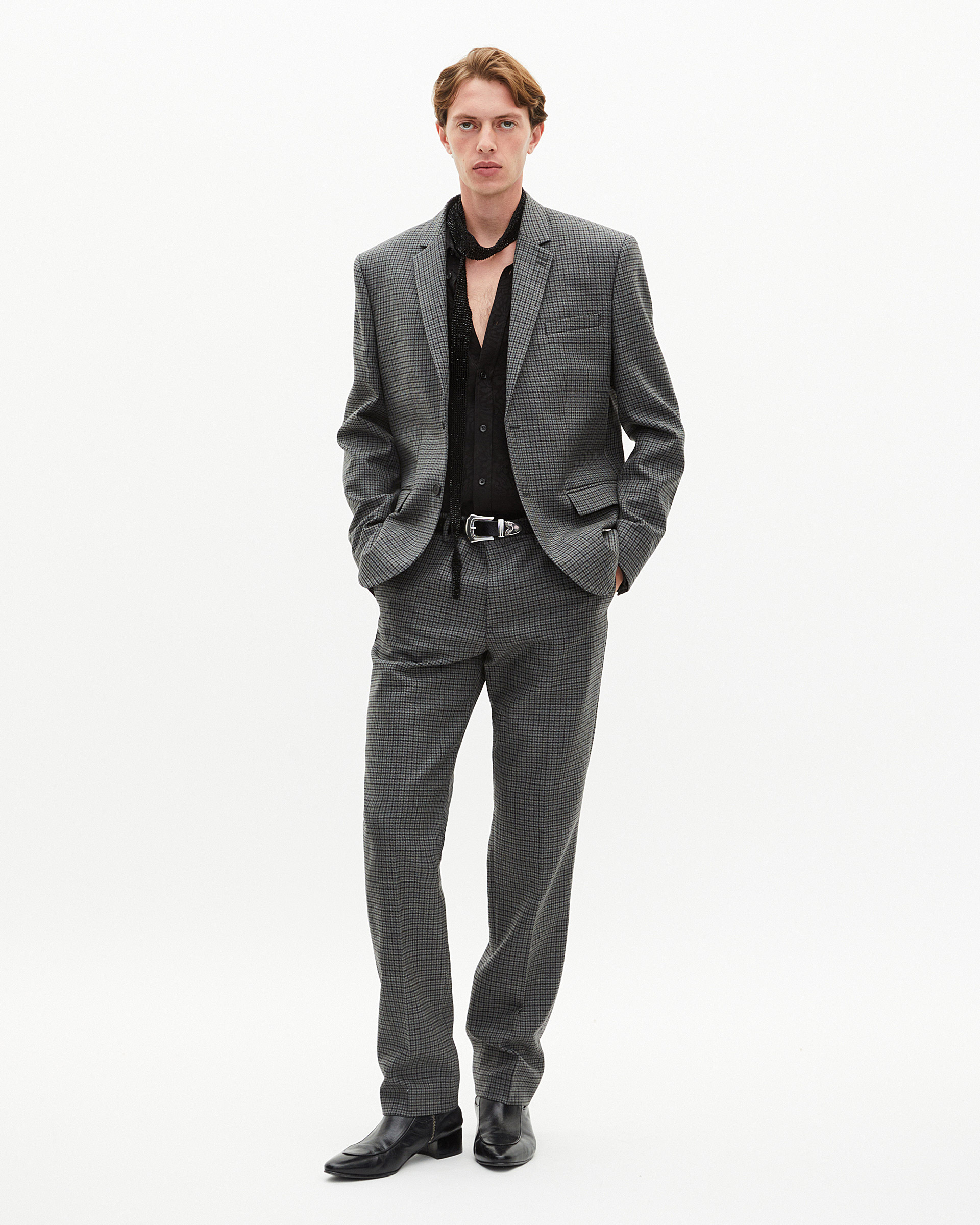 Black and grey houndstooth suit jacket
