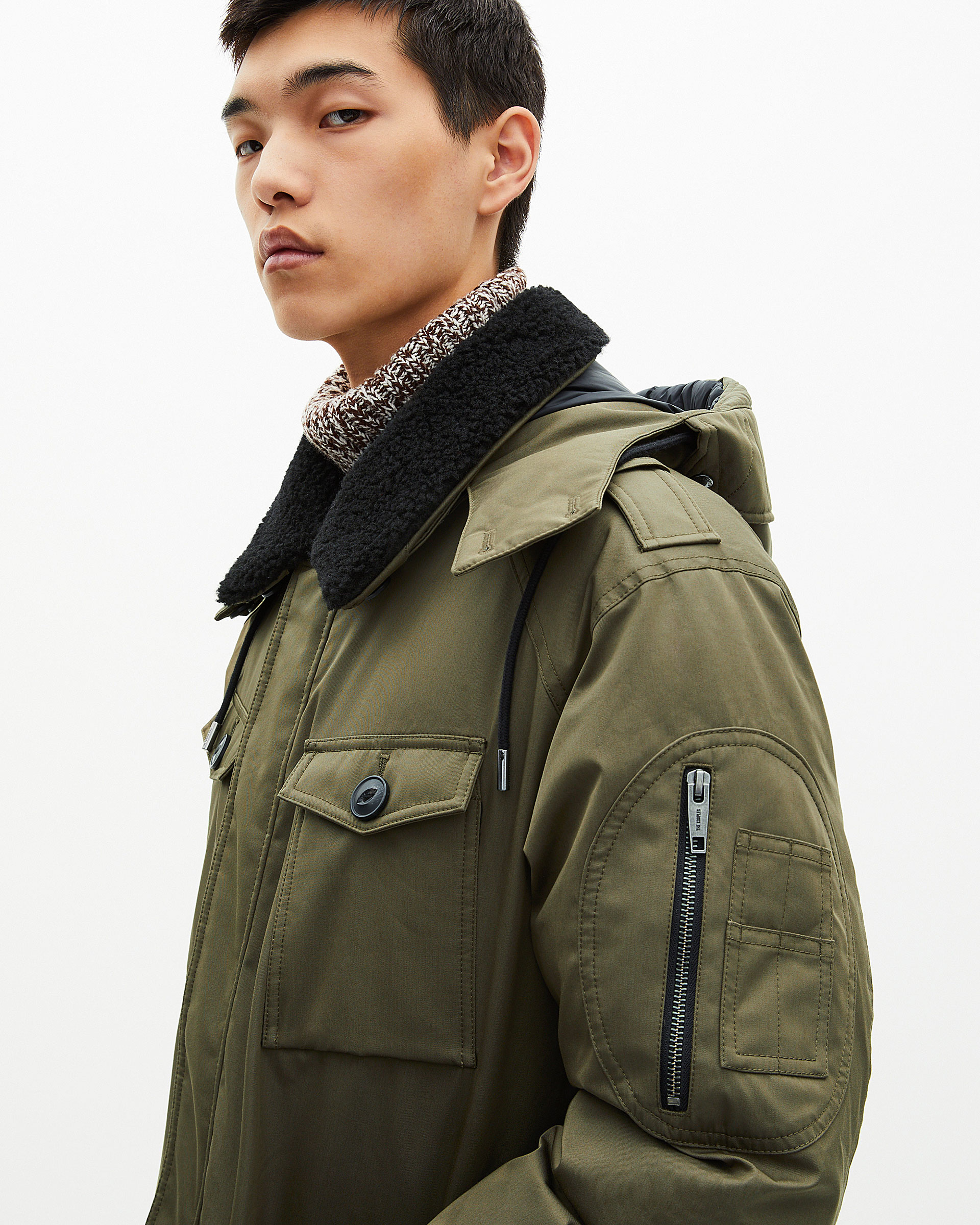 Water-repellent parka with khaki sherpa collar
