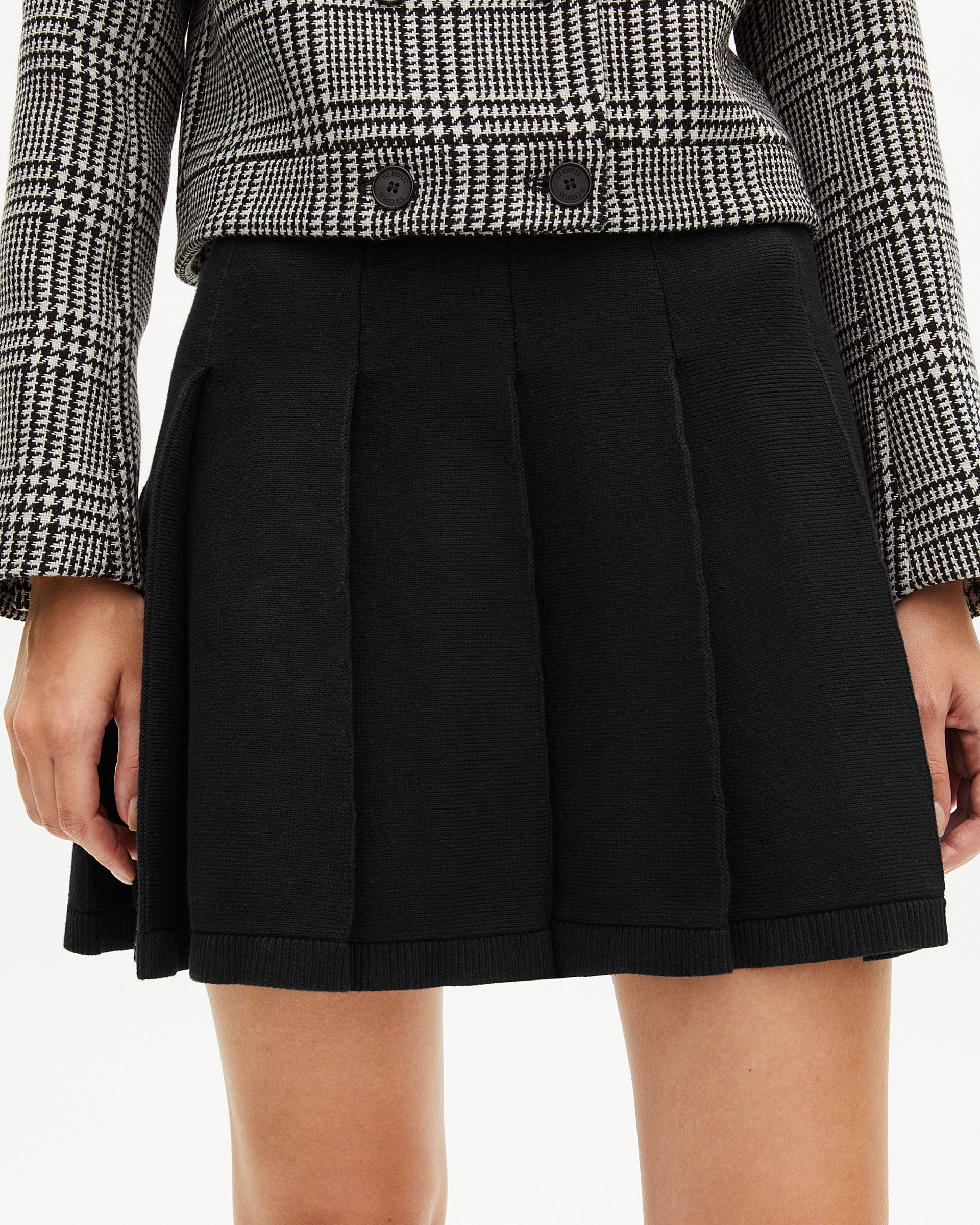 Short black mesh skirt