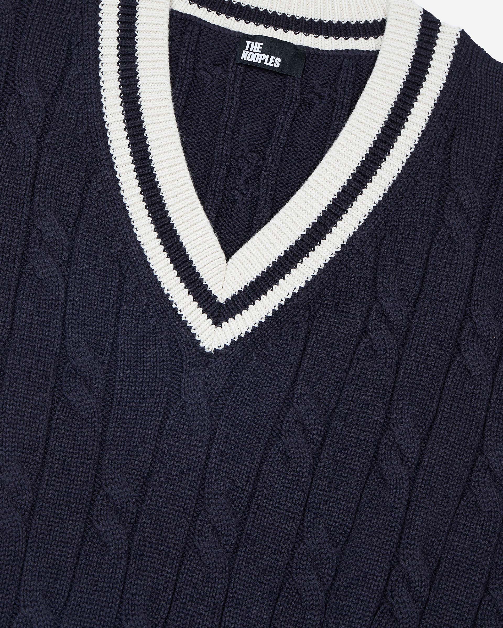 Sleeveless navy cotton sweater