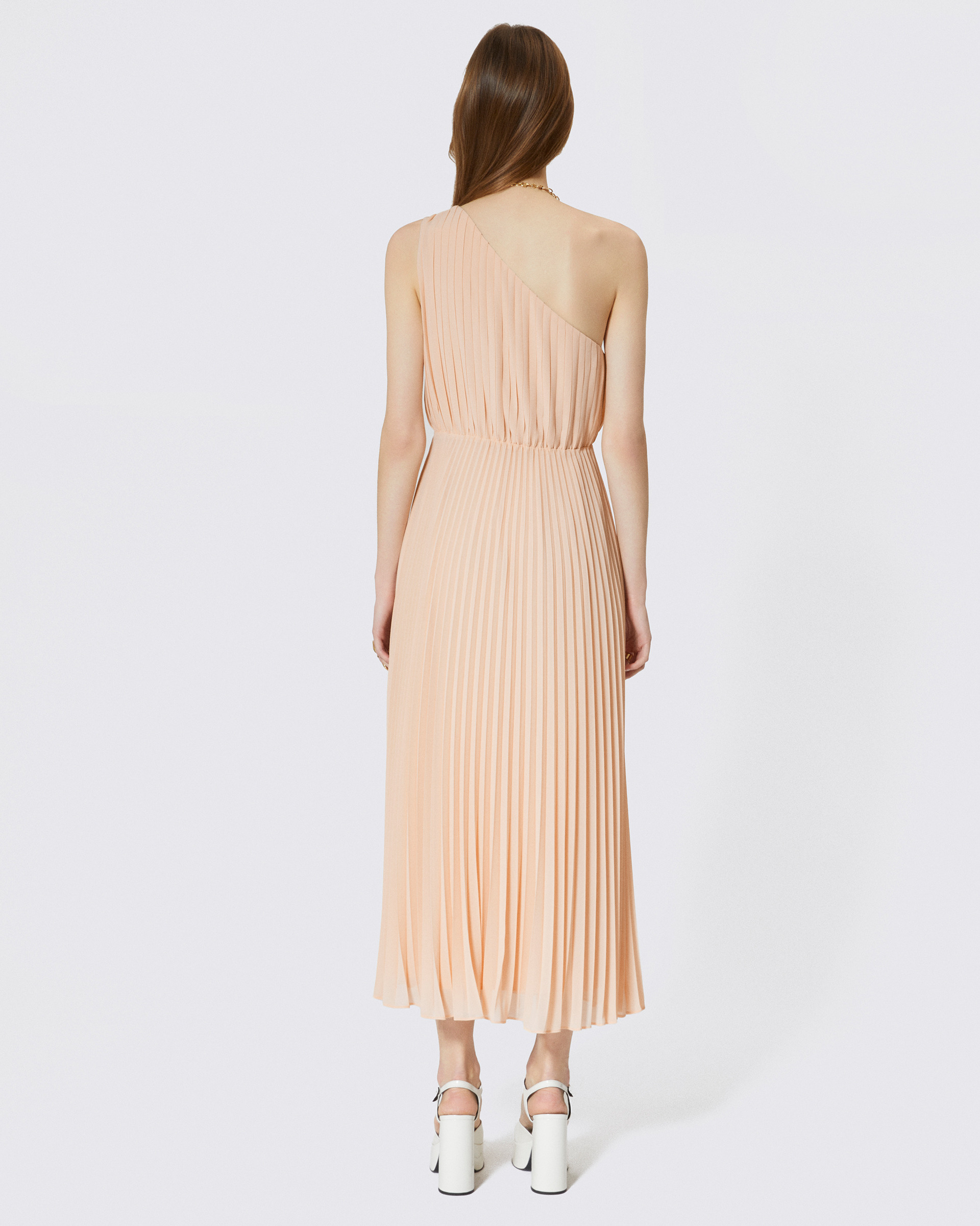 Long asymmetrical pleated peach dress