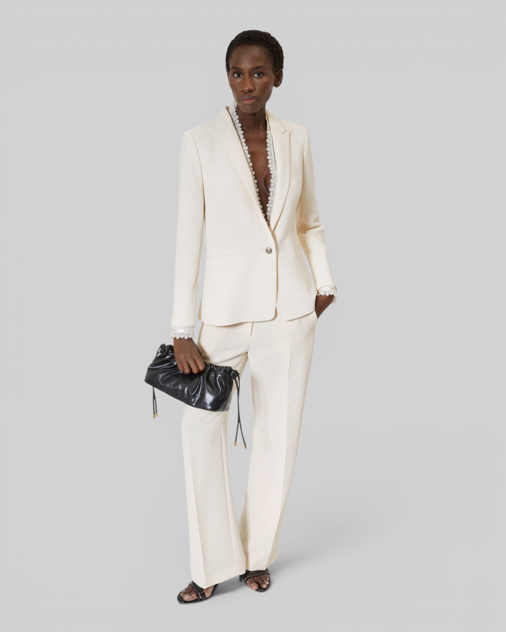 Suit jacket with ecru lace band