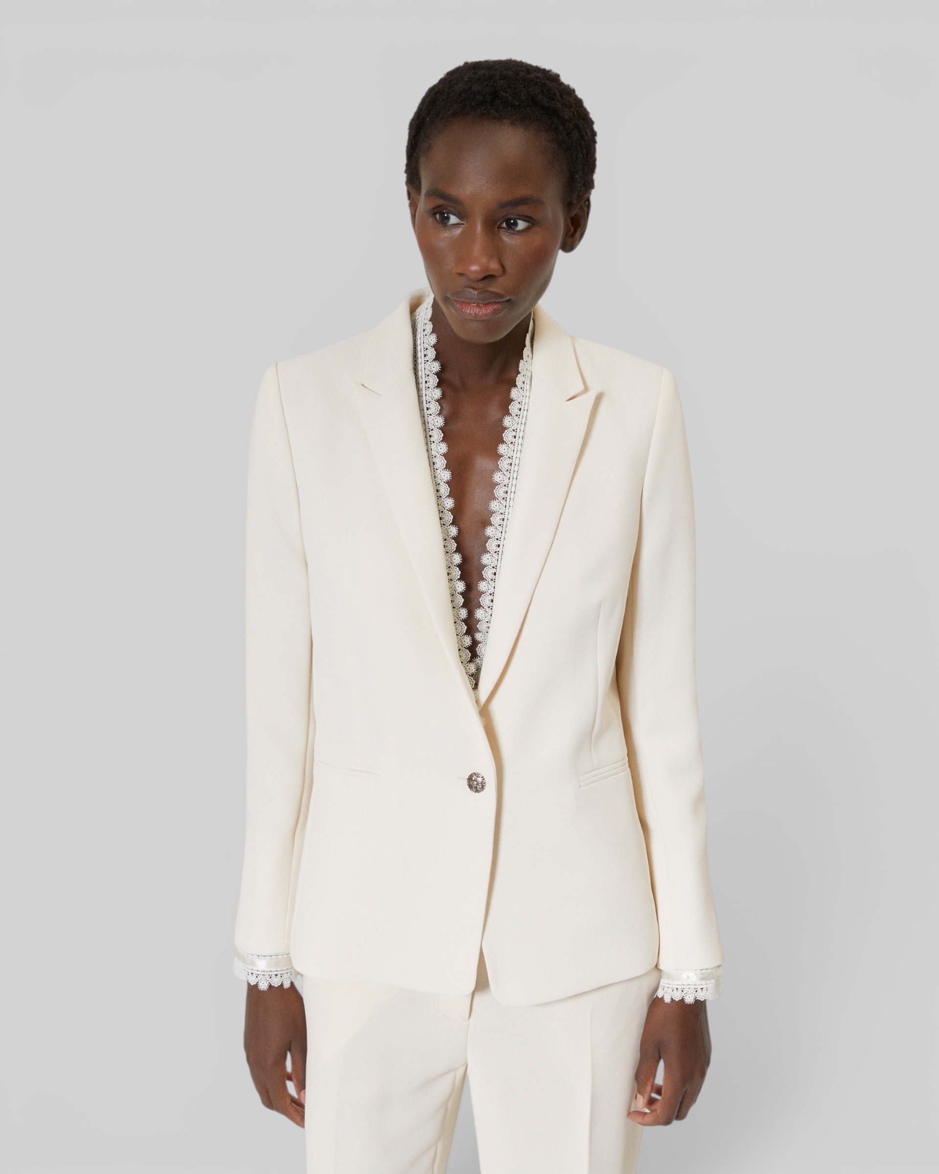 Suit jacket with ecru lace band