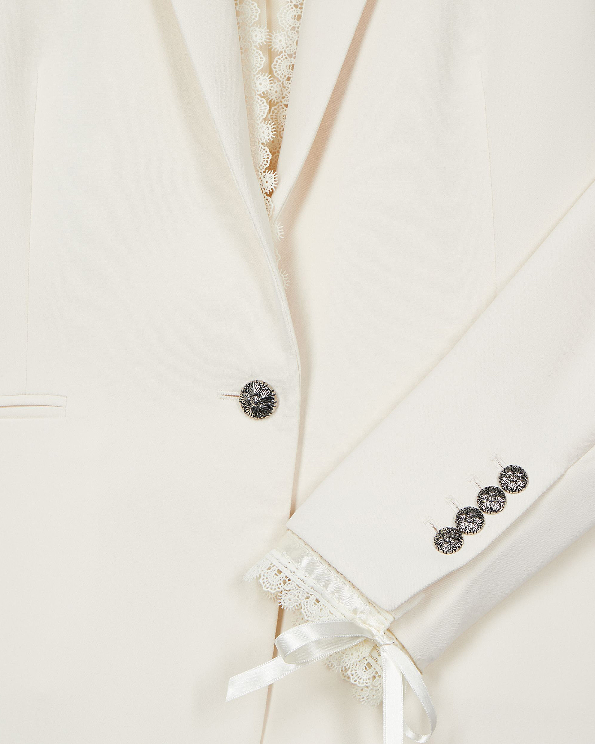 Suit jacket with ecru lace band