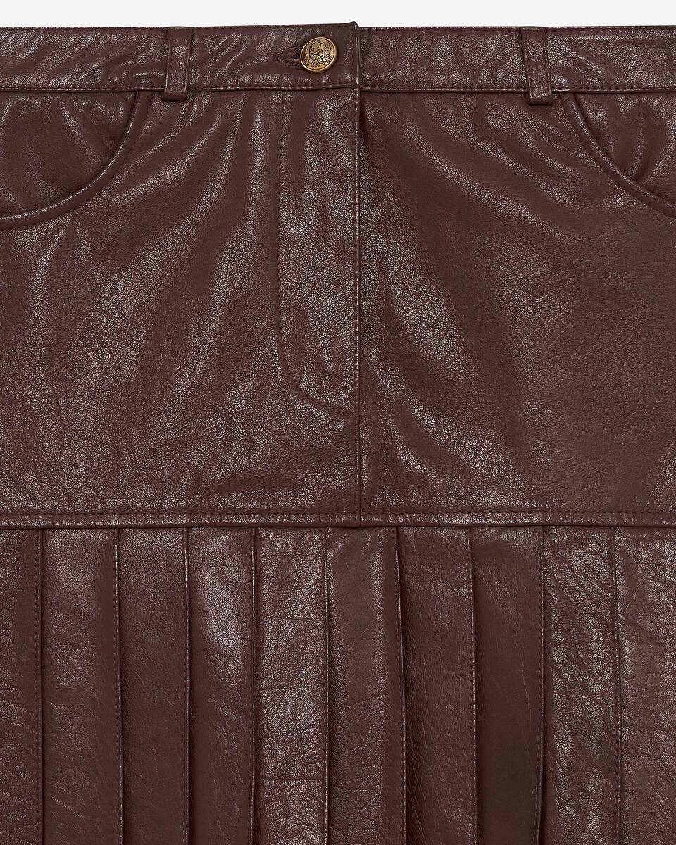 Short pleated skirt in brown leather