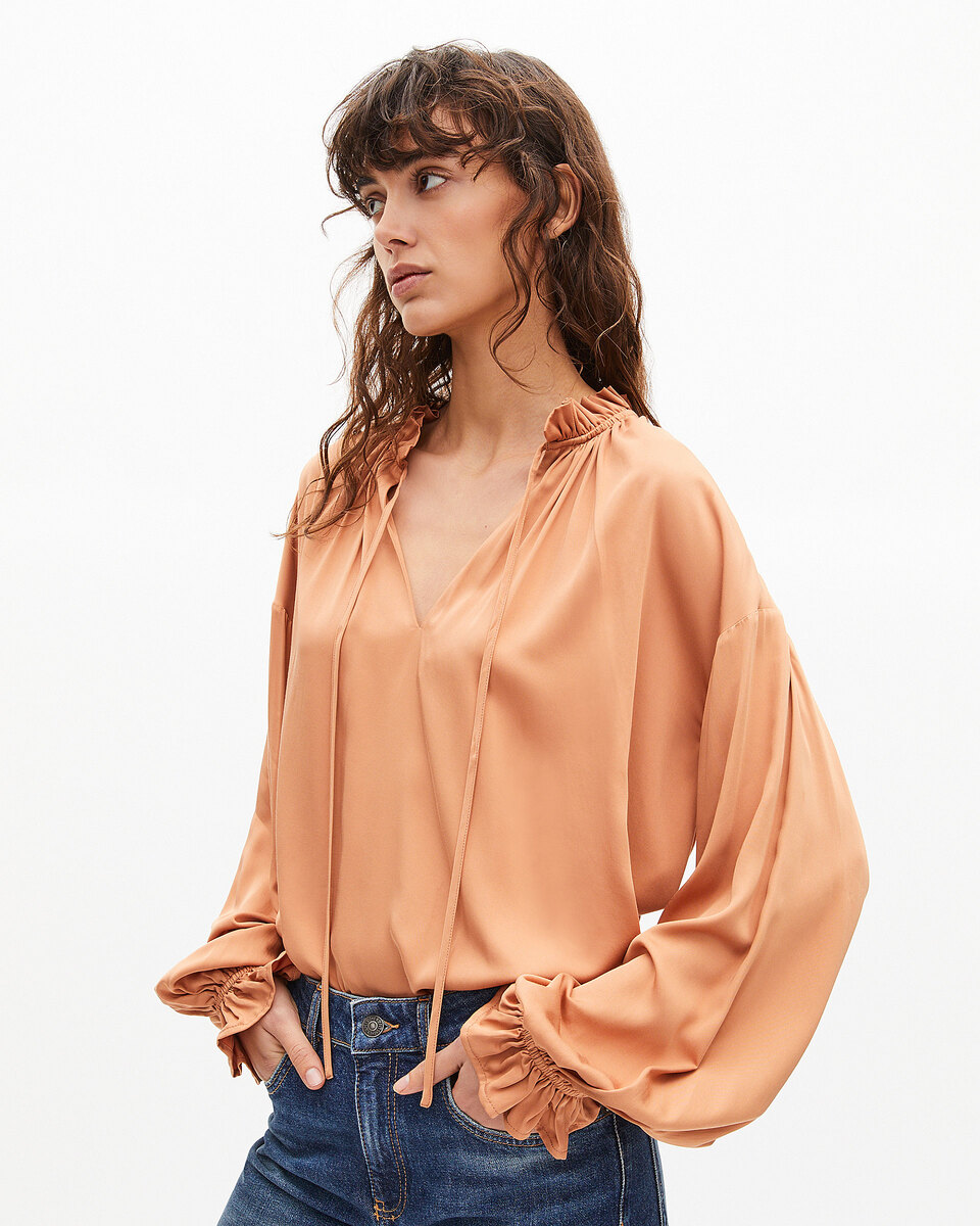 Blouse with dark orange ruffles