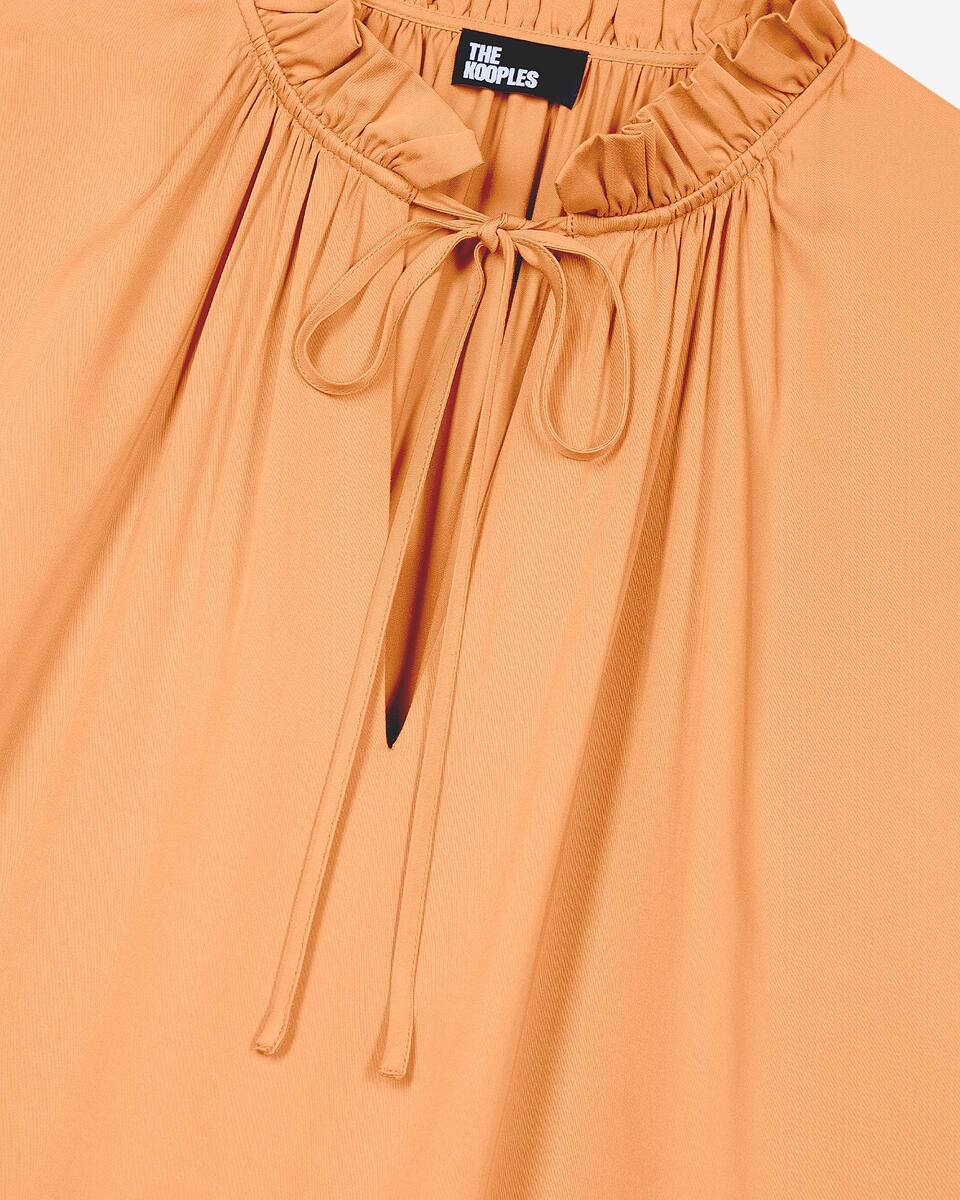 Blouse with dark orange ruffles