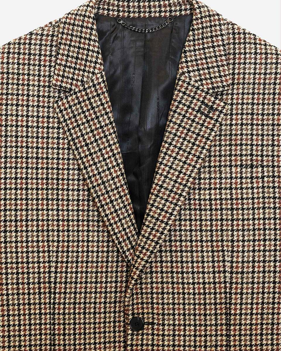 Brown and black houndstooth jacket