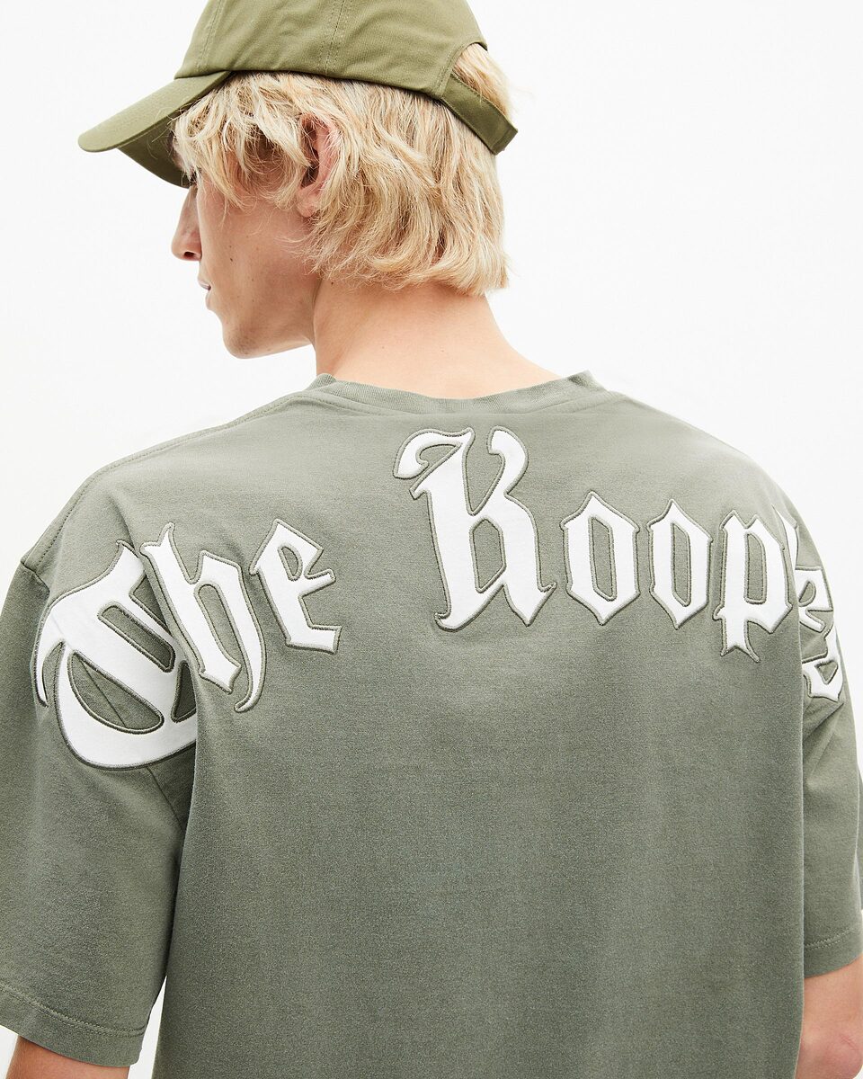 T-shirt with green logo on back