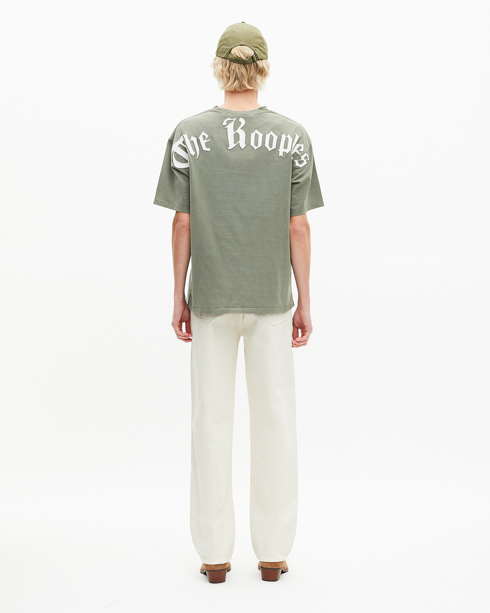 T-shirt with green logo on back
