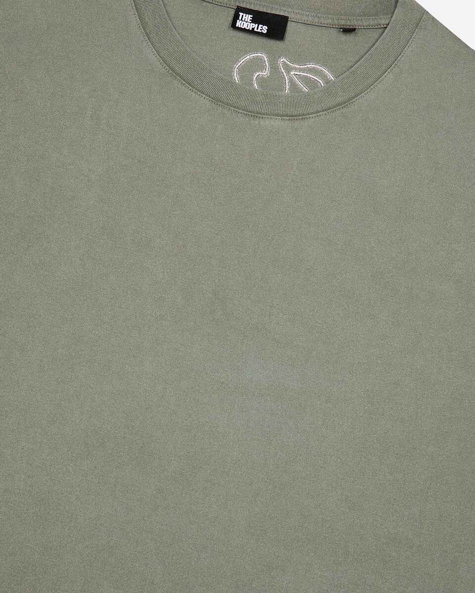 T-shirt with green logo on back