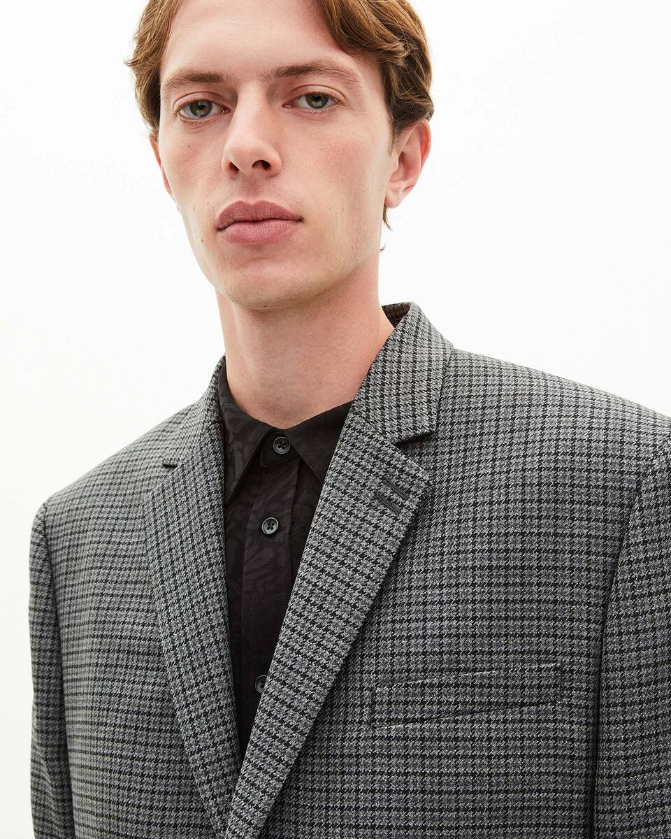 Black and grey houndstooth suit jacket