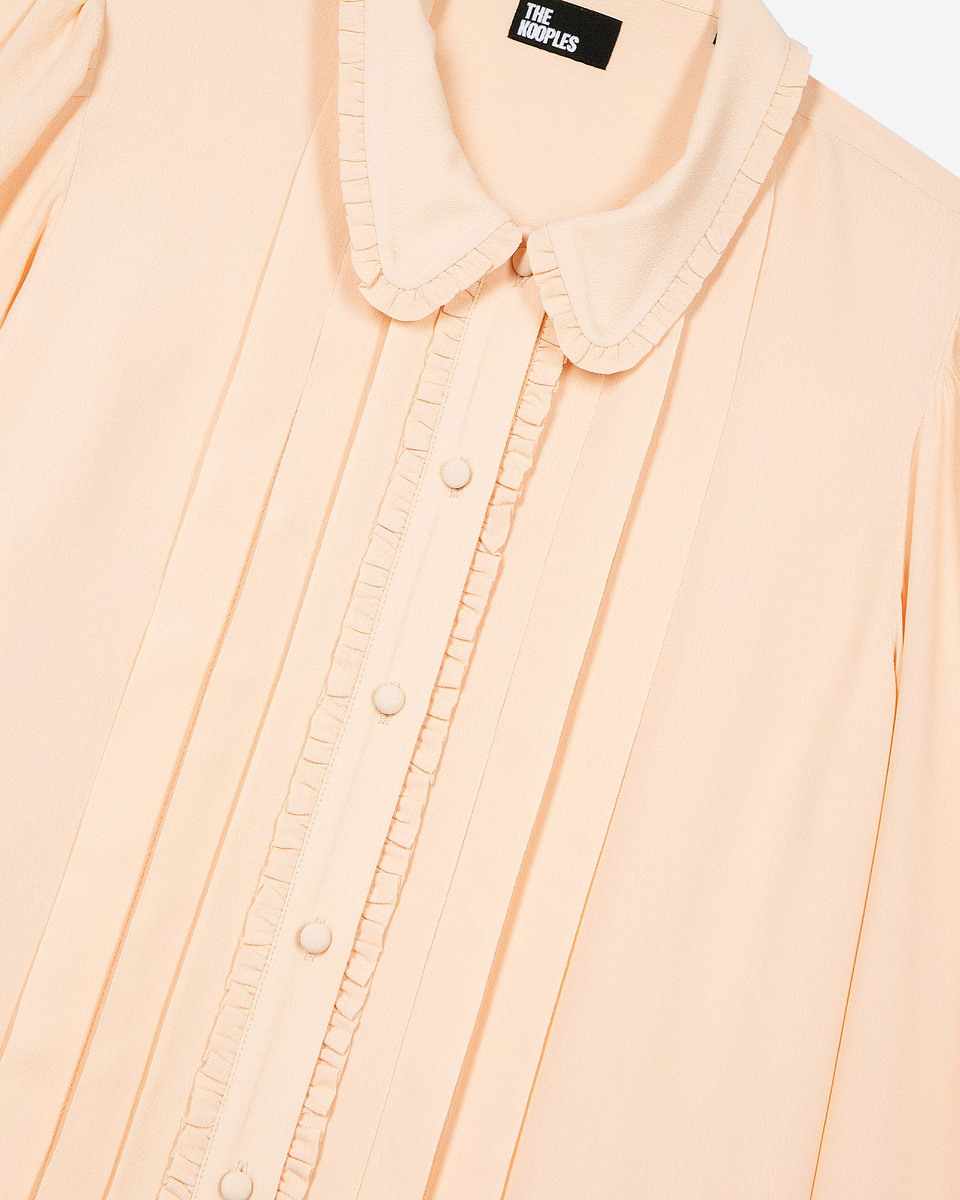 Shirt with peach pleat detail