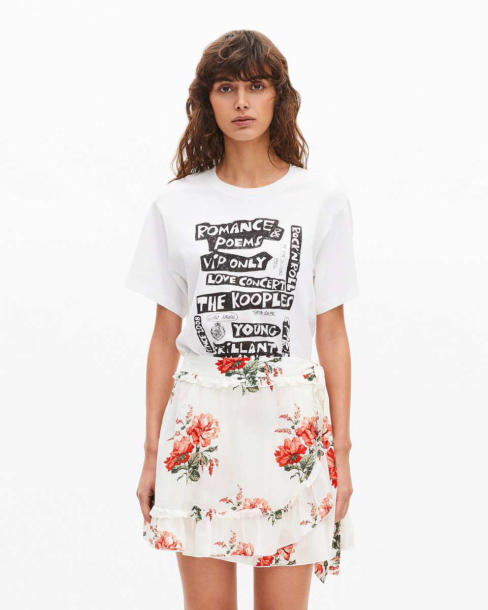 Short white floral print wrap skirt