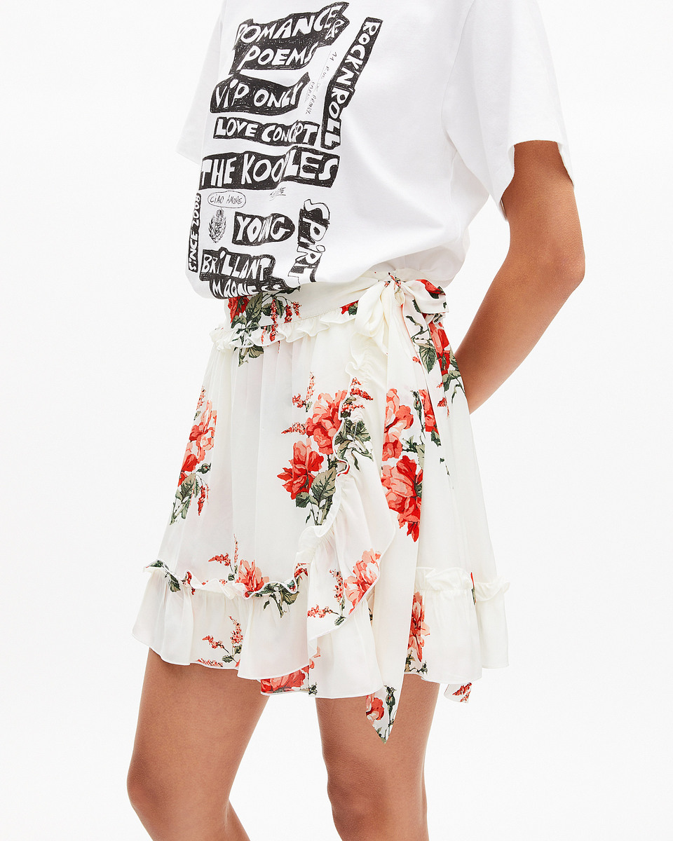 Short white floral print wrap skirt