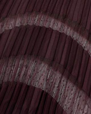 Long burgundy pleated skirt