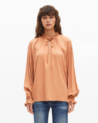 Blouse with dark orange ruffles