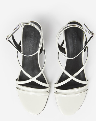 White patent leather heeled sandals
