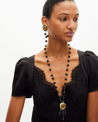 Pearl necklace with orange pendant