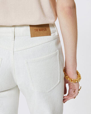 Off white coated straight jeans