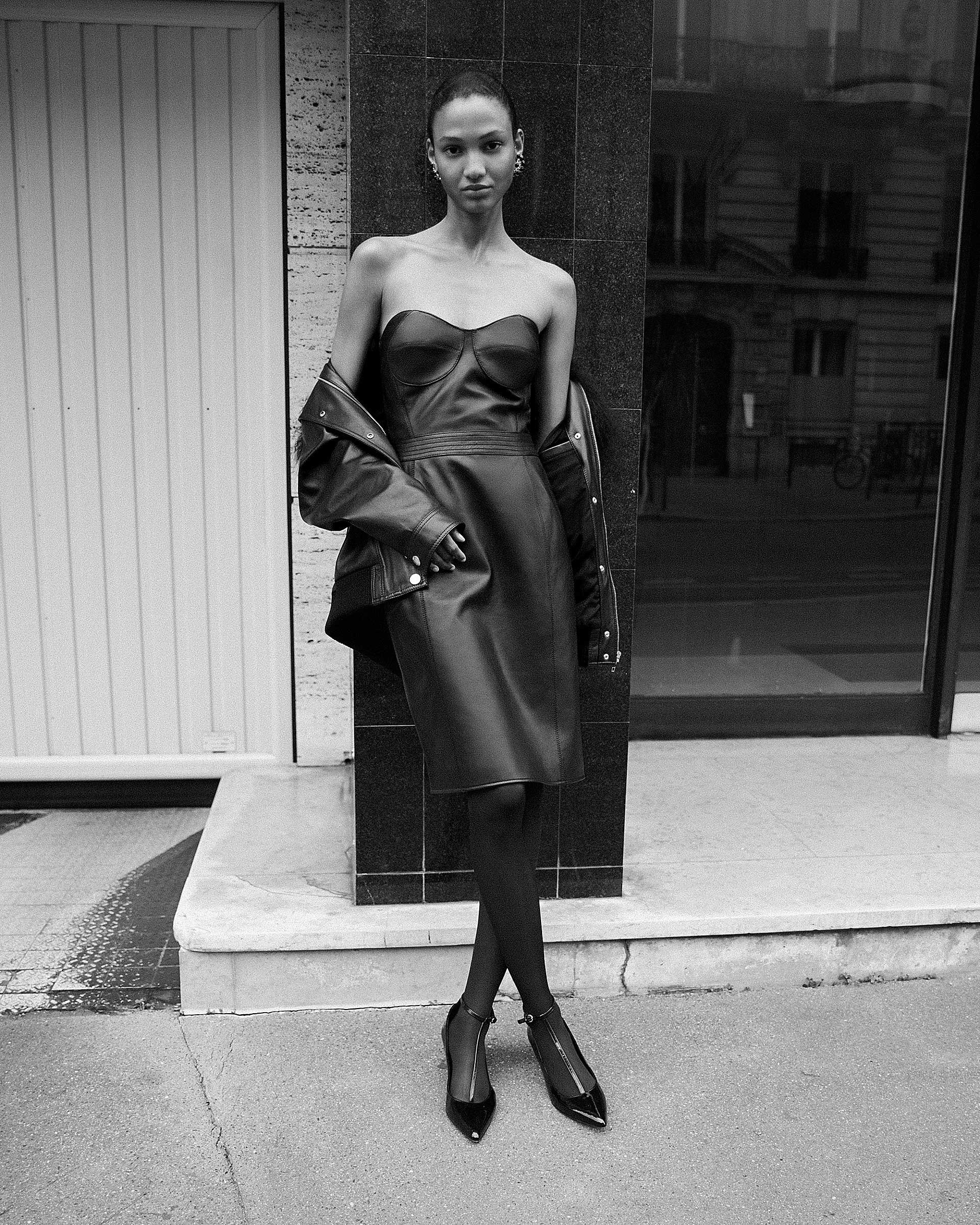 Short strapless black leather dress