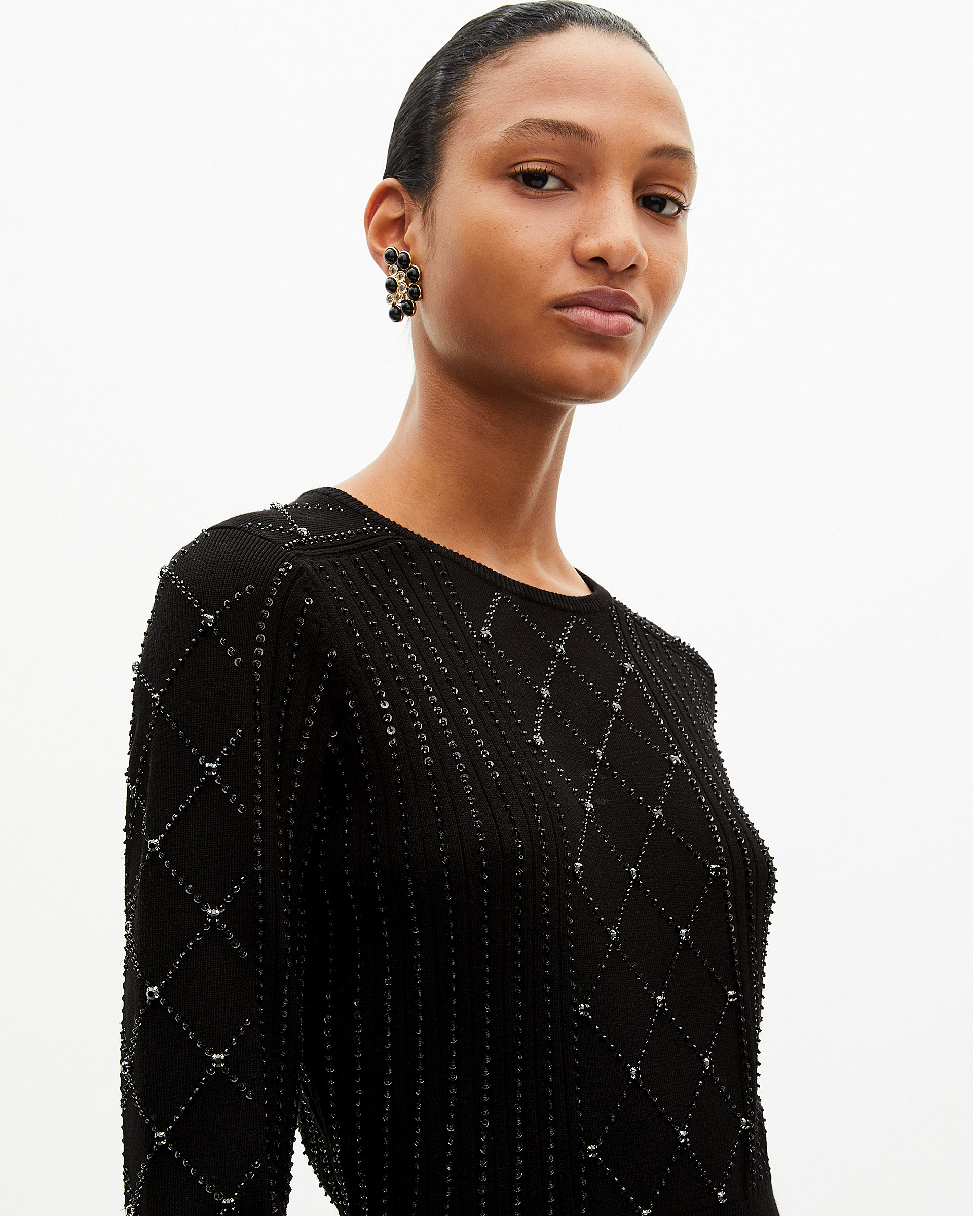 Short knitted dress with rhinestones and pearls, black