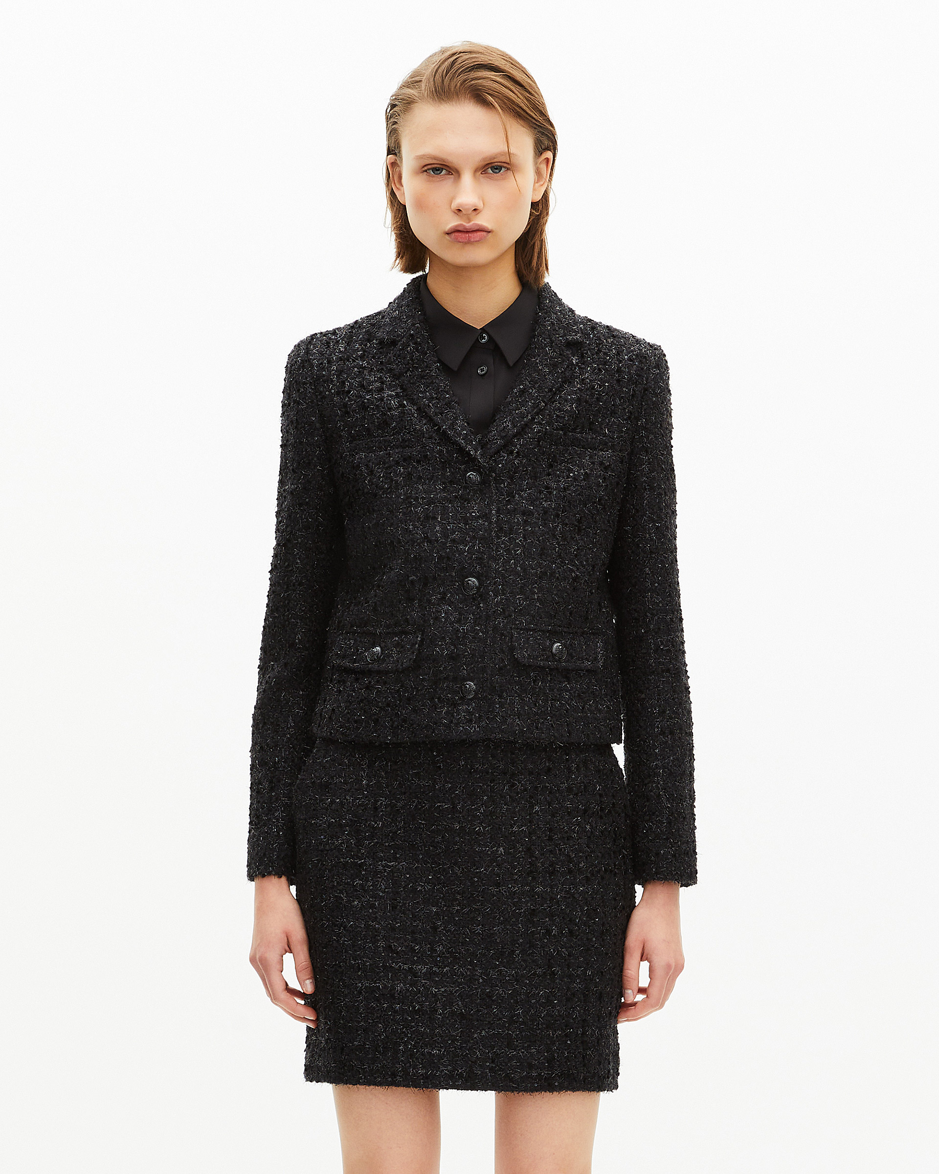 Short jacket in shiny black tweed