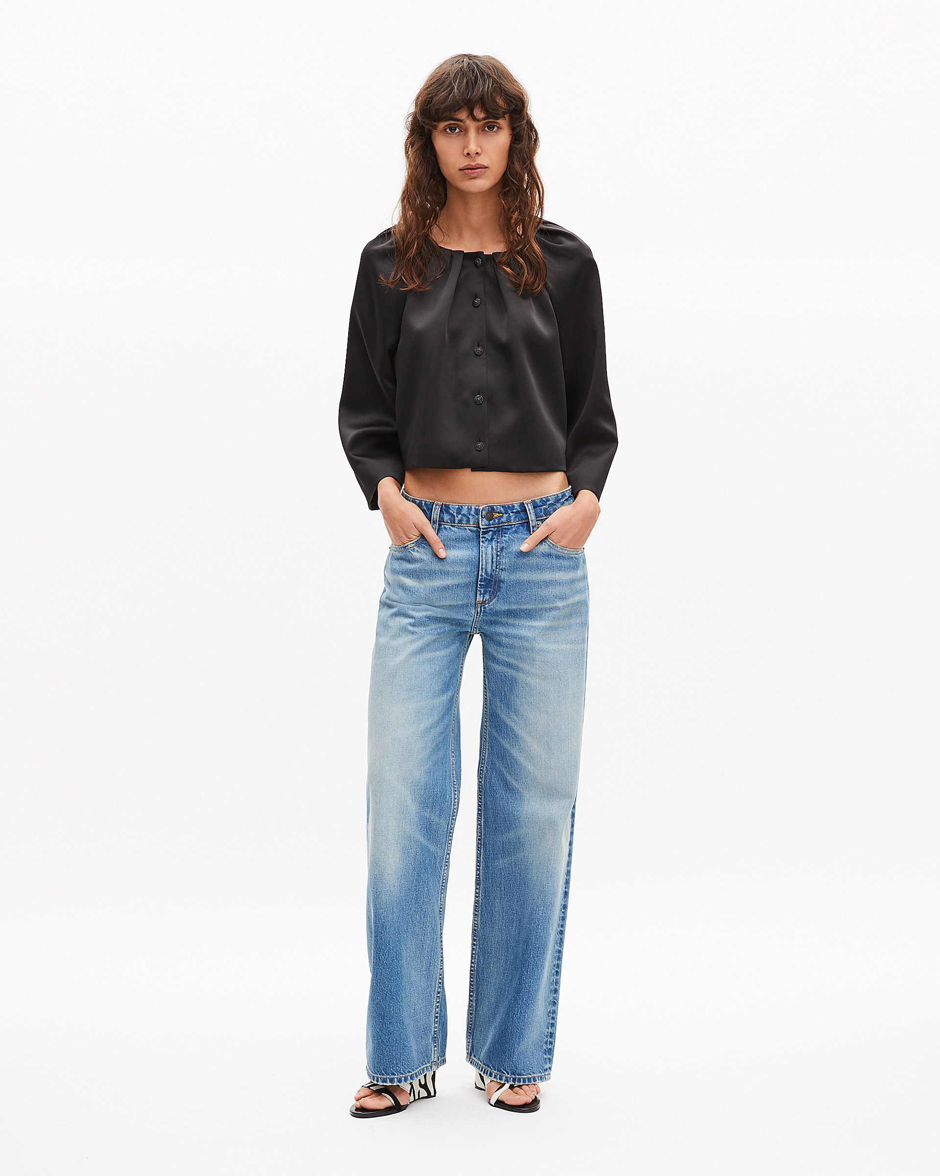 Short cape-effect jacket in black satin