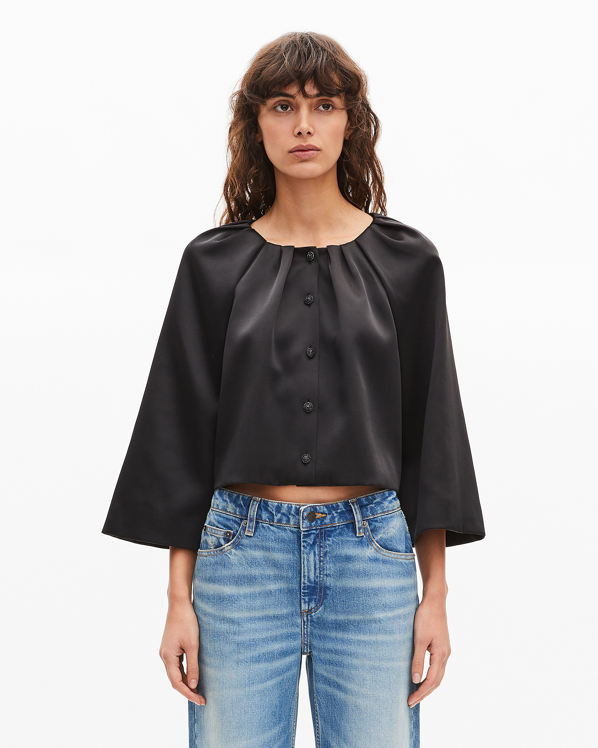 Short cape-effect jacket in black satin