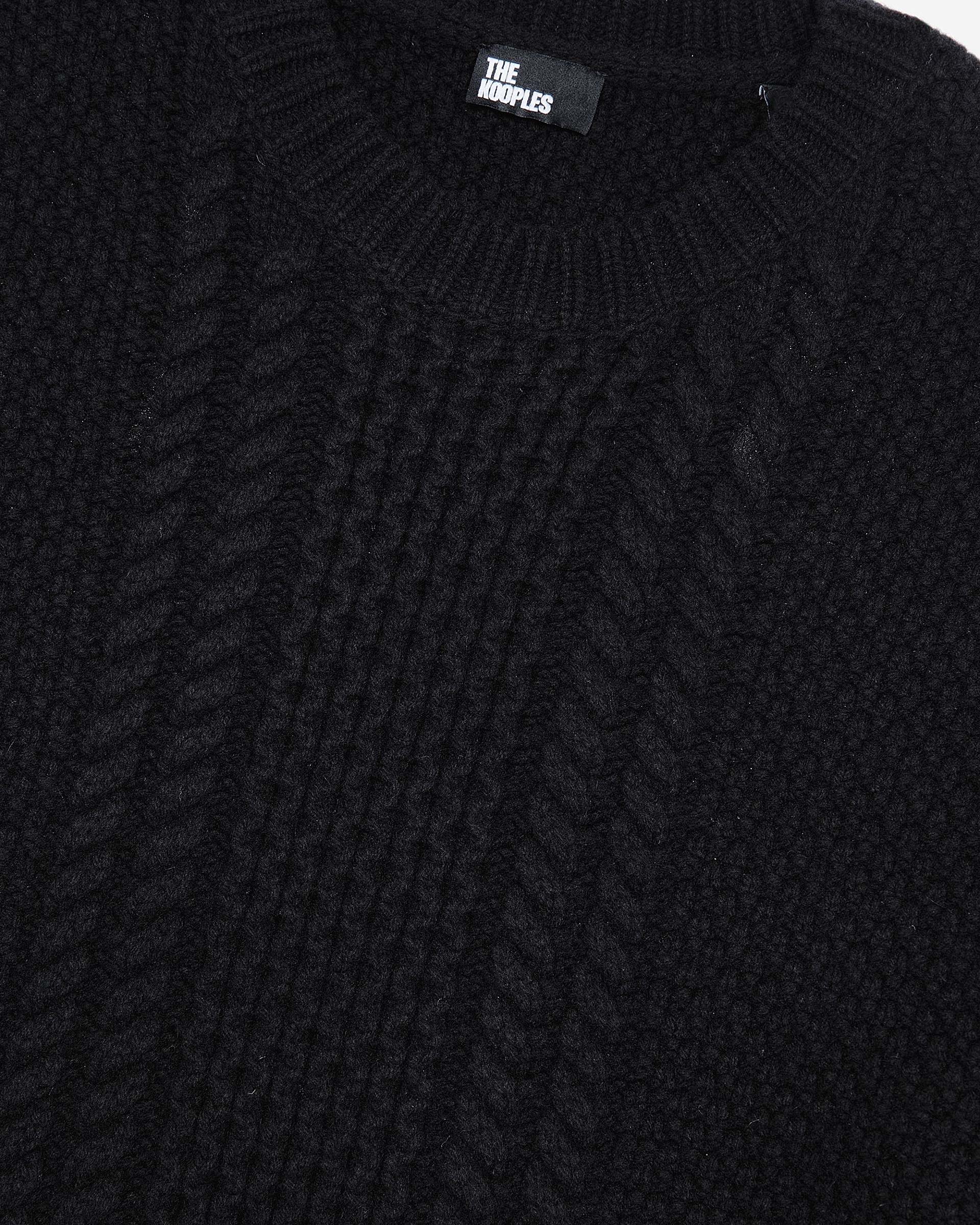 Black wool cable sweater