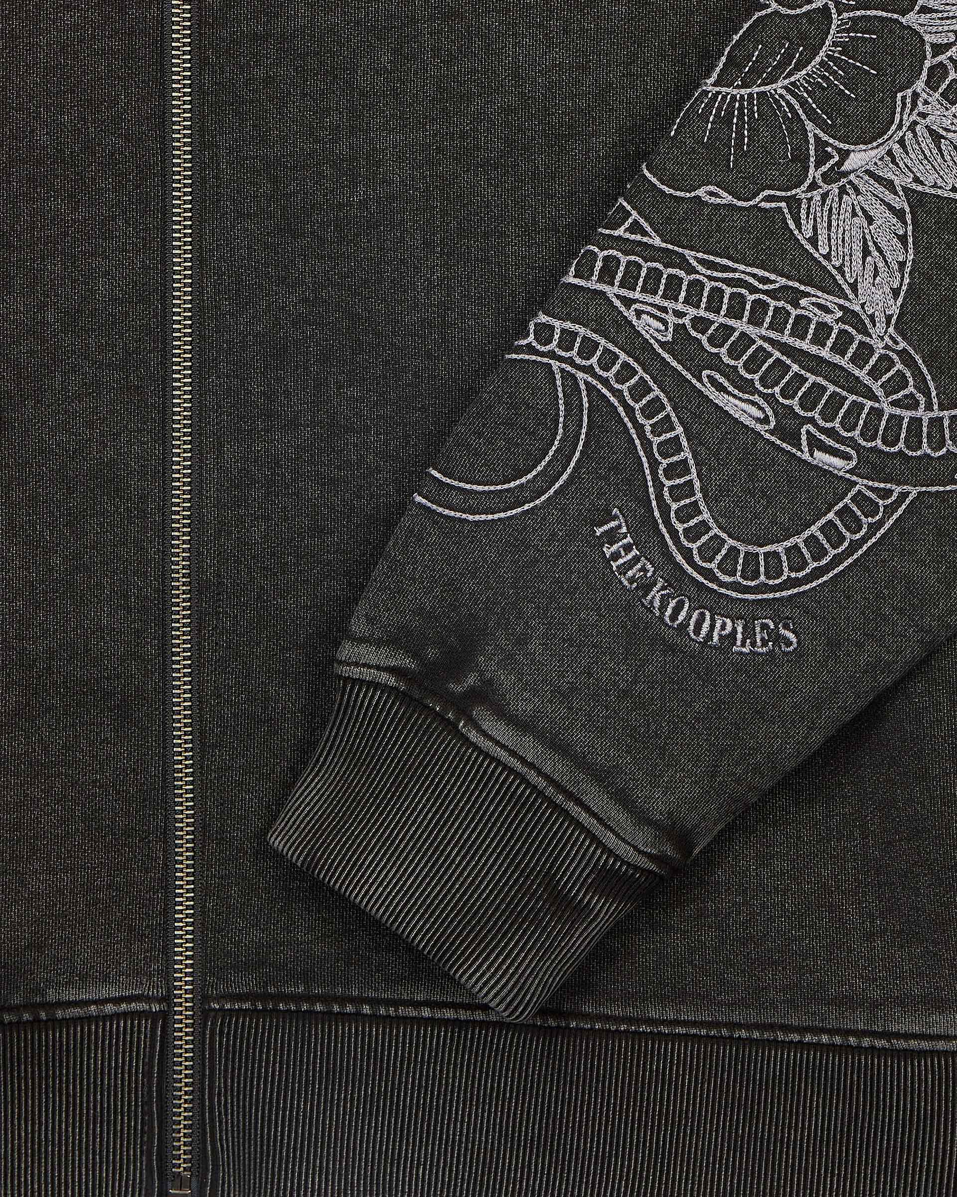Hooded sweatshirt with black embroidery