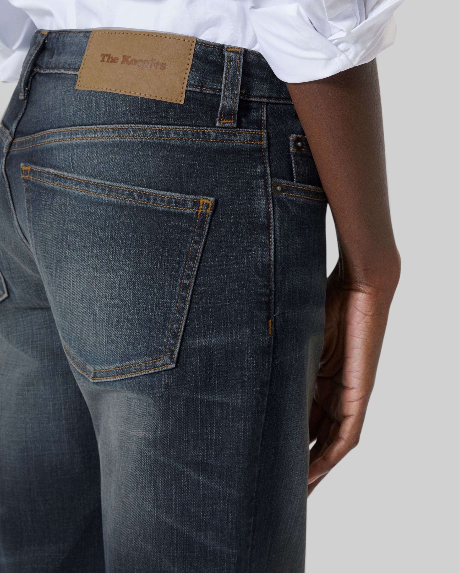 Bootcut jeans with blue abrasions
