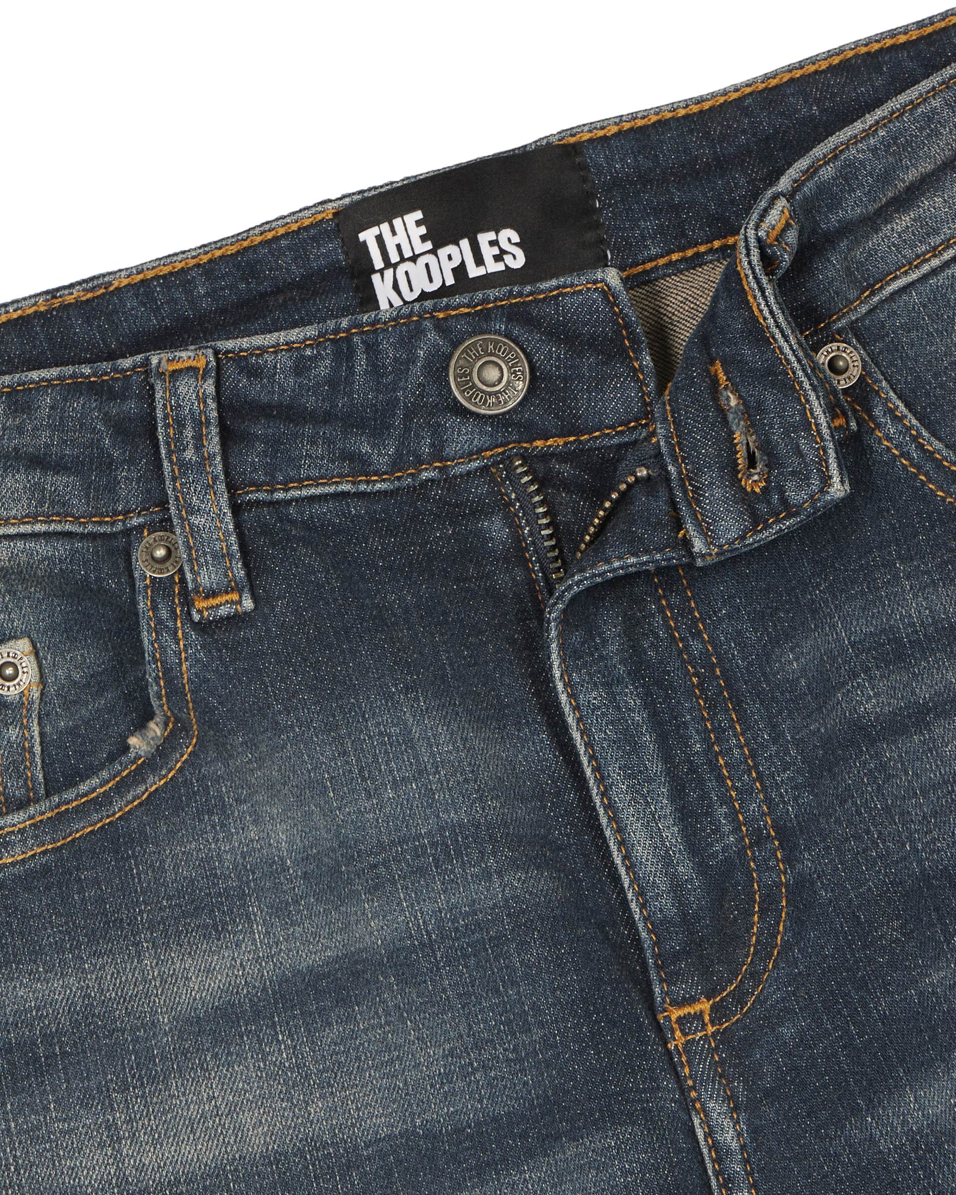 Bootcut jeans with blue abrasions