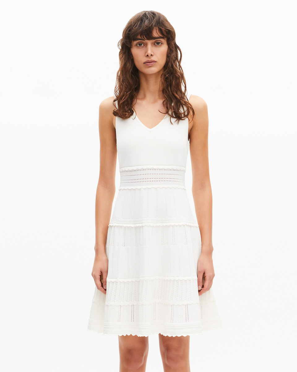 Short dress in ecru knit