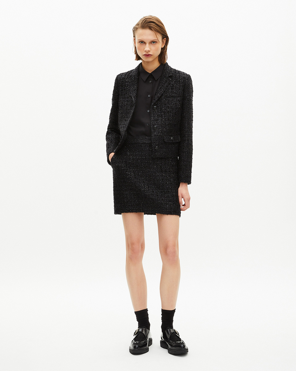 Short jacket in shiny black tweed
