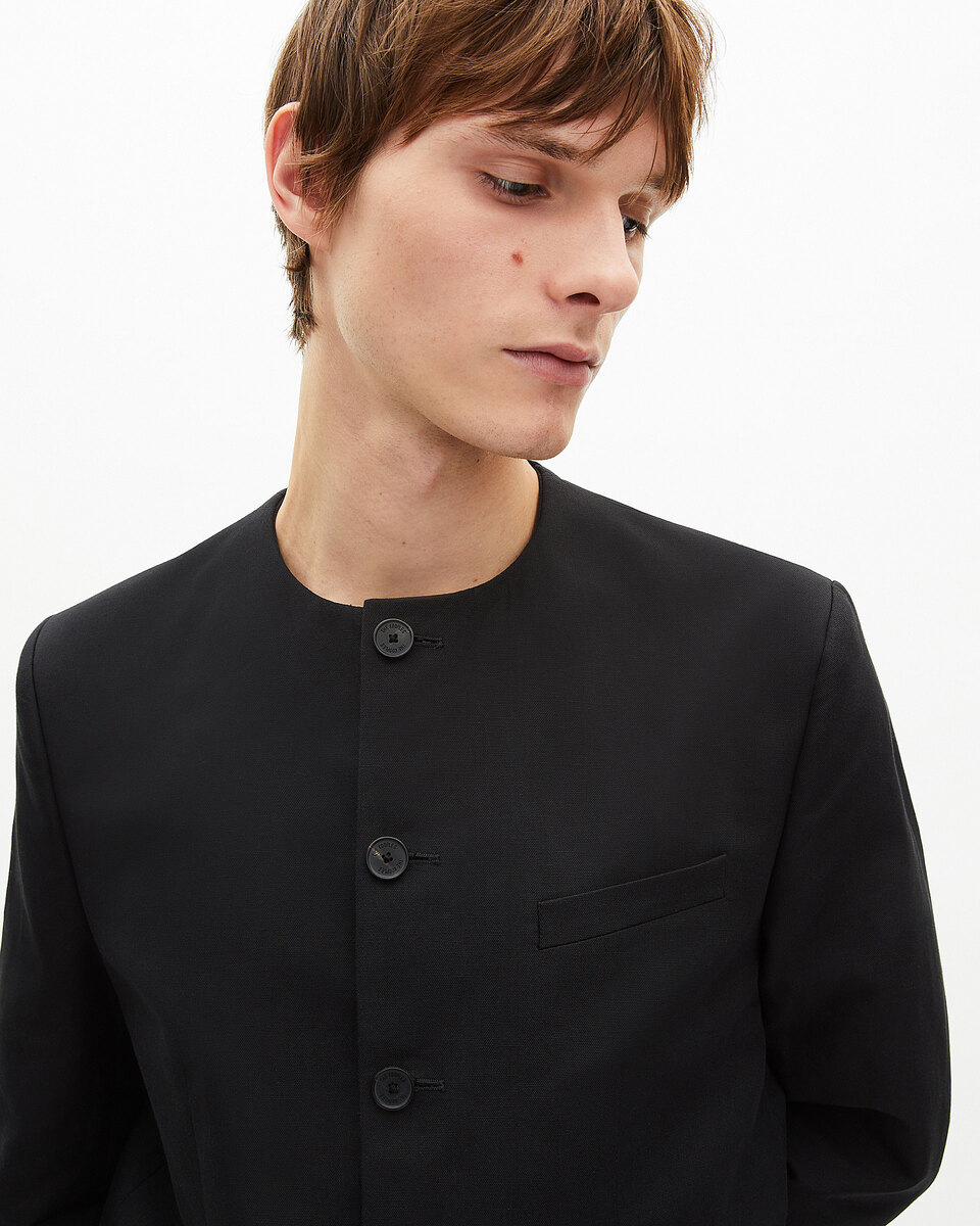 Black collarless jacket