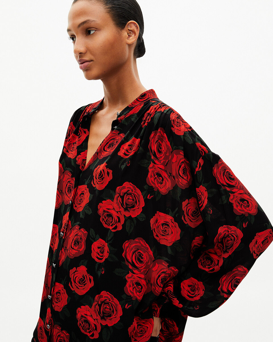 Loose-fitting black floral print shirt