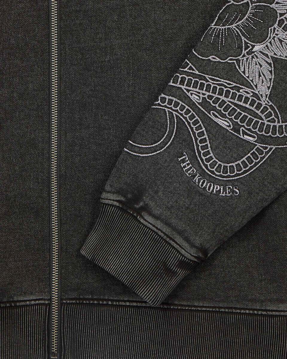 Hooded sweatshirt with black embroidery