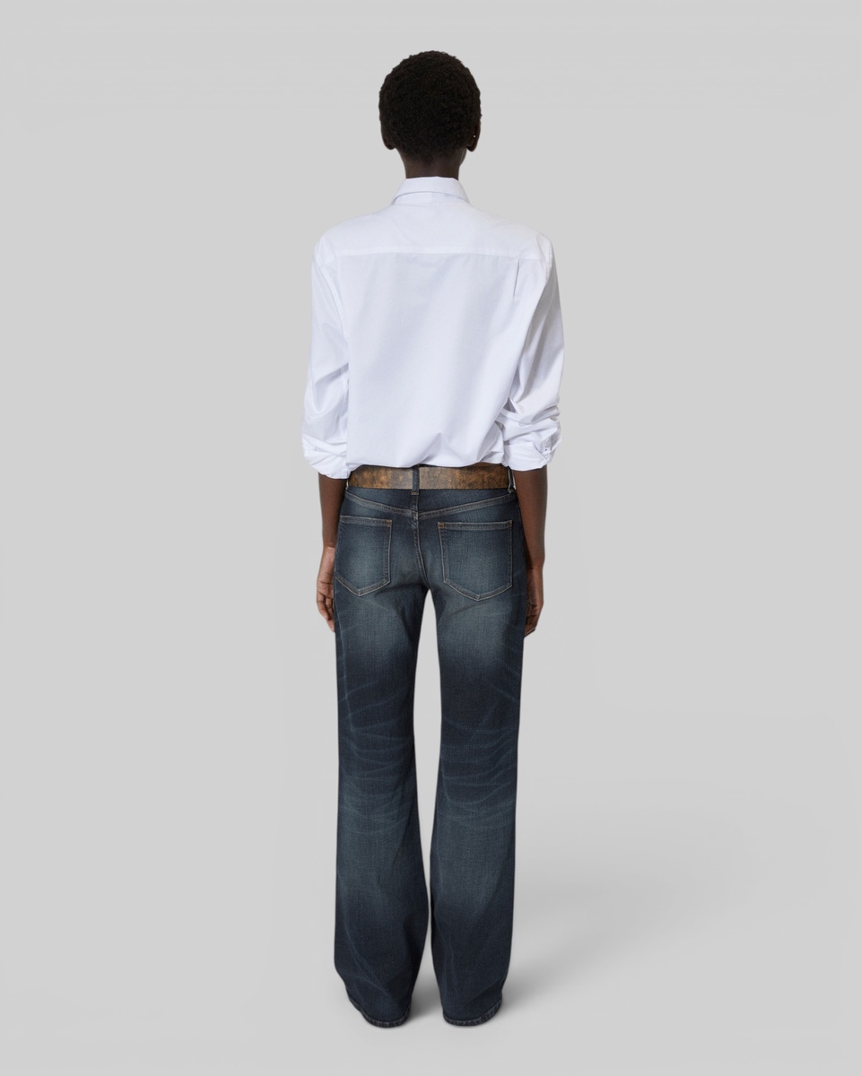 Bootcut jeans with blue abrasions