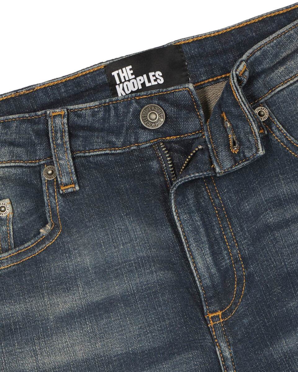 Bootcut jeans with blue abrasions