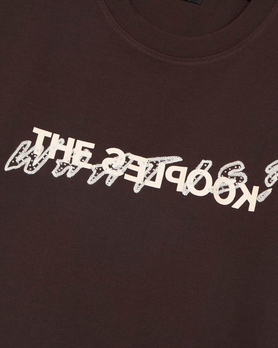'What Is' T-shirt with brown rhinestones