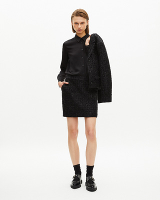 Short skirt in shiny black tweed