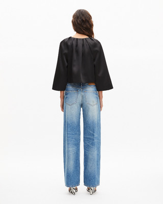 Short cape-effect jacket in black satin